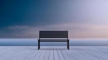 A solitary black bench on a wooden deck overlooking a serene twilight landscape photo