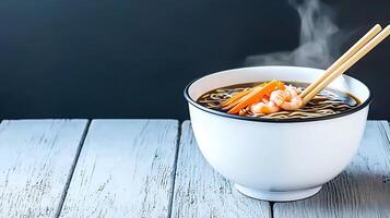A steaming bowl of shrimp ramen with vegetables on a rustic wooden table, evoking warmth photo