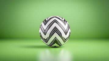 A stylized black and white patterned soccer ball resting on a vibrant green background photo