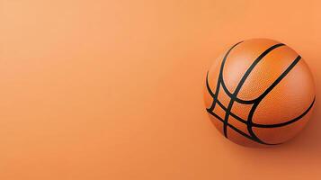 A vibrant orange basketball resting on a smooth surface with a simple background for sports themes photo