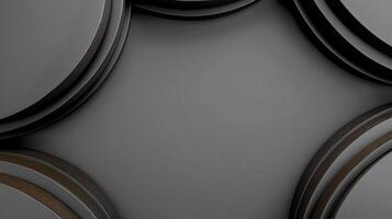 Abstract arrangement of circular black objects on a dark background, creating a modern aesthetic photo