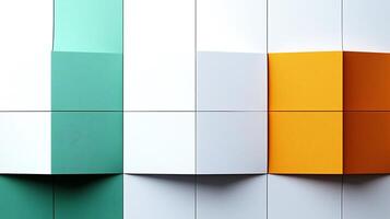 Abstract arrangement of colored paper blocks in green, white, and orange creating a modern art piece photo