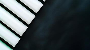 Abstract arrangement of white geometric shapes on a dark background creating a modern aesthetic photo