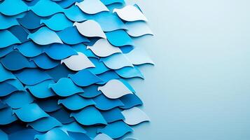 Abstract blue wave pattern with layered paper texture on a light background, ideal for design use photo