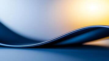 Abstract close-up of a smooth blue curve with soft lighting in the background creating depth photo