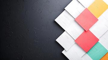Abstract composition of colorful geometric shapes against a textured dark background photo