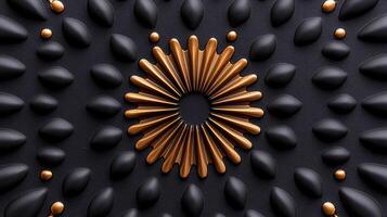 Abstract design featuring a symmetrical arrangement of black and gold elements on a dark background photo