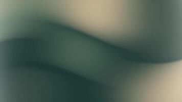 A green and beige background with a wave pattern video