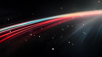 Abstract light trails with vibrant colors and particles creating a dynamic background effect photo