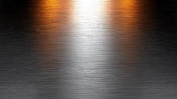 Abstract metallic surface with gradient reflections of orange and white light, creating depth photo
