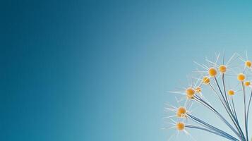 Abstract representation of delicate yellow dandelion seeds against a blue gradient background photo