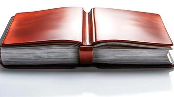 An open leather-bound book showcasing blank pages on a reflective surface, evoking creativity photo