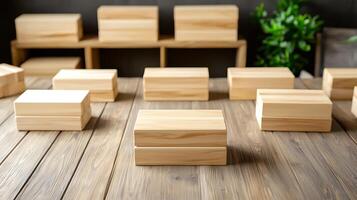 Arrangement of wooden boxes on a rustic table with greenery in the background, showcasing simplicity photo