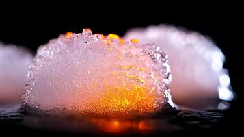 Bubbles illuminated in vibrant orange glow, creating a captivating abstract scene in darkness photo
