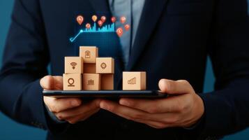 Business professional presenting data analytics with wooden blocks on a tablet, showcasing growth trends photo