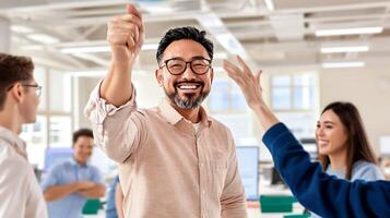 Celebrating team success in a modern office with cheerful colleagues engaging in collaboration photo