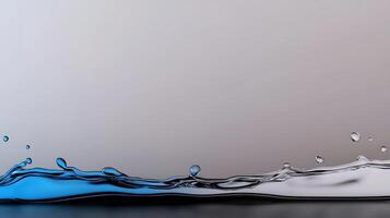 Close-up of a dynamic water splash with blue highlights against a smooth gray background photo