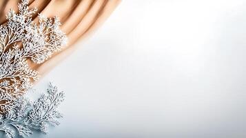 Close-up of a hand gently holding a delicate lace-like snowflake against a soft background photo