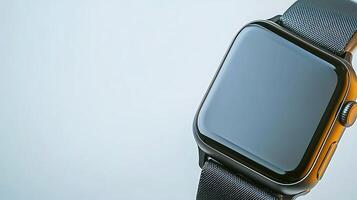 Close-up of a modern smartwatch on a light background, showcasing its sleek design and functionality photo
