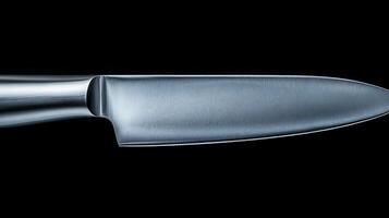 Close-up of a polished kitchen knife against a black background, showcasing its sleek design and sharp edge photo
