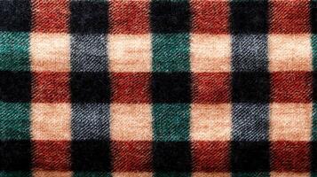 Close-up of a textured plaid fabric with vibrant colors and patterns, ideal for textile design photo
