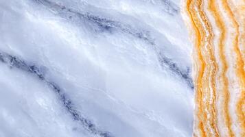 Close-up of elegant marble texture showcasing white and orange patterns with smooth surface photo