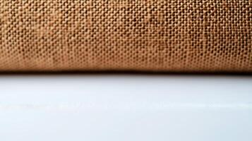 Close-up of textured fabric roll on a white surface with soft lighting, ideal for design use photo