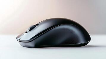 Close-up view of a sleek black computer mouse on a minimalistic desk with soft background photo
