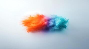 Colorful abstract cloud of orange and blue hues blending together on a soft white background photo