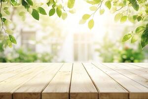 An empty wooden table with green leaves in the background photo