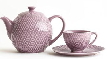 Lavender-hued tea set with diamond pattern photo