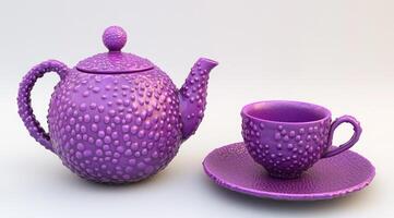 Purple speckled teapot and cup set photo