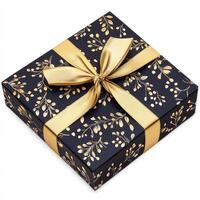 Gift box with gold ribbon and floral design photo