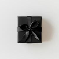 Black gift box with ribbon photo