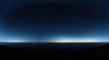 Night to day transition over a city photo