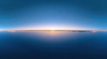 Sunrise above clouds photo