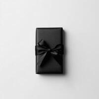 Black gift box with satin ribbon photo