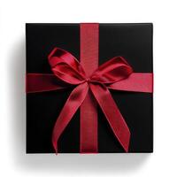 Elegant black gift box with red ribbon photo