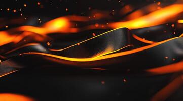 Abstract black fabric waves in fiery orange glow photo