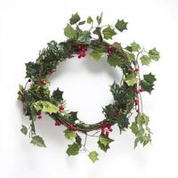 A wreath with holly leaves and berries on a white background photo
