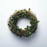 Circular Christmas wreath with holly and berries photo