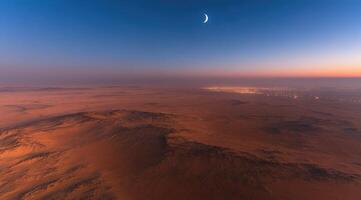 Vast desert landscape at sunrise photo