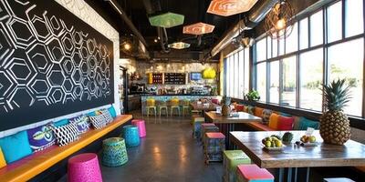 Vibrant, modern cafe with colorful accents photo