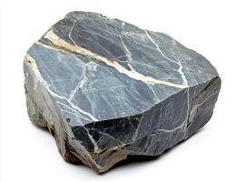 Rough, dark gray stone with white veins photo