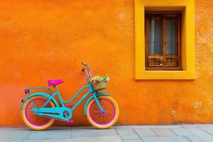 Vibrant bicycle parked against a colorful wall photo