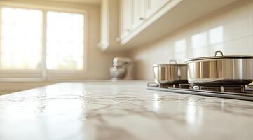 Modern kitchen countertop with stainless steel cookware photo