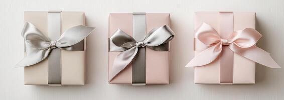 Three Gift Boxes with Elegant Ribbons photo