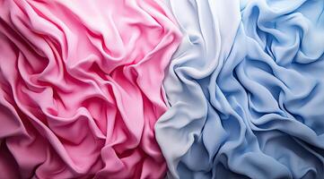 Soft, draped fabric in pink and light blue photo