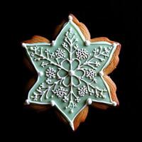 Ornate snowflake-shaped Christmas cookie photo