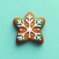 Festive star-shaped gingerbread cookie decorated with a snowflake design photo